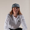 Blue Unstructured Hat - Title MTB shown on female model unisex mountain bike lifestyle hat girl 