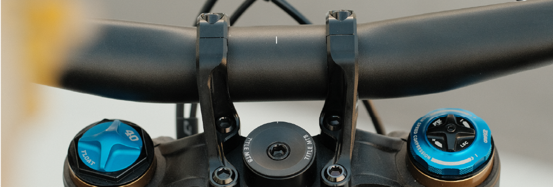 Close up of mountain bike handlebar and stem 