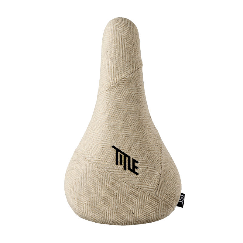 Beige bicycle seat with 'Title' logo on a white background