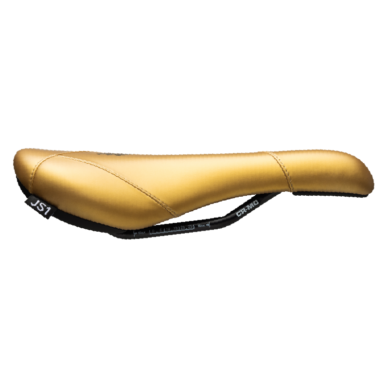 Gold bicycle seat on a white background
