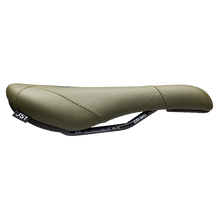 Green bicycle seat on a white background