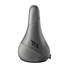 Gray bicycle seat with 'Title' branding on a white background