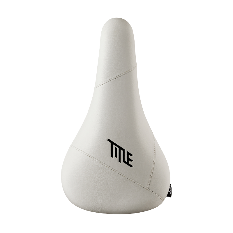 White bicycle seat with 'TITLE' logo on a white background