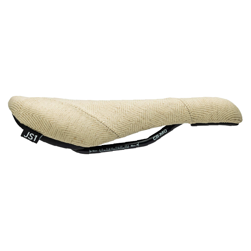 Beige bicycle saddle with black straps on a white background