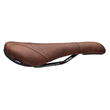 Brown bicycle saddle with visible branding on a white background