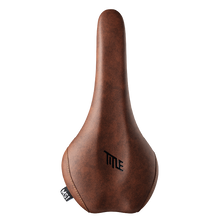 Brown bicycle saddle with 'TITLE' branding on a white background
