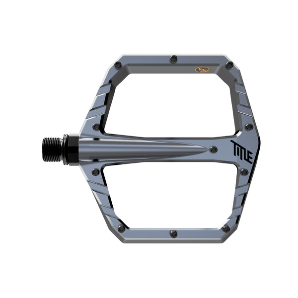 Silver bicycle pedal with 'Title' branding on a white background