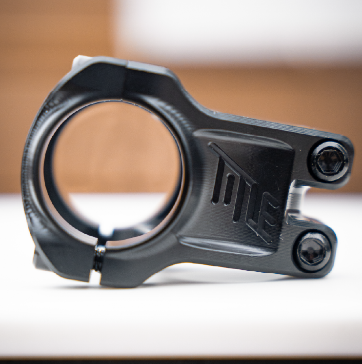 Close-up of a black Title MTB ST2 on a blurred background