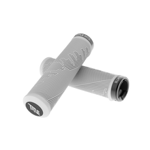 White thick bicycle handlebar grips with Title MTB branding on a white background