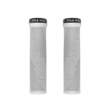 Two bicycle handlebar grips with geometric pattern and 'TITLE MTB' branding on a white background