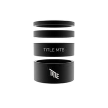 black headset spacers with 'TITLE MTB' branding on a white background